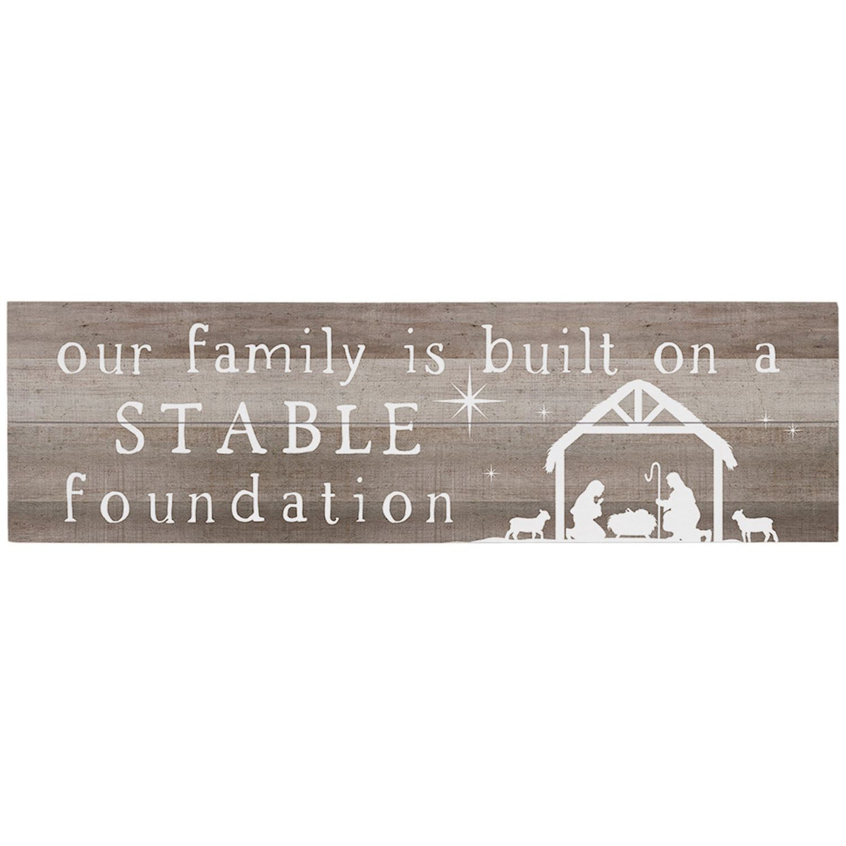 Wooden sign with nativity scene and text 'our family is built on a STABLE foundation' on a white background