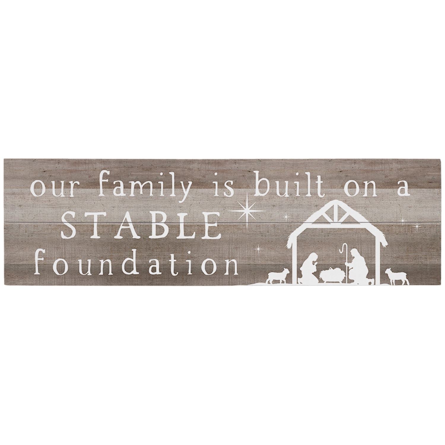 Wooden sign with nativity scene and text 'our family is built on a STABLE foundation' on a white background