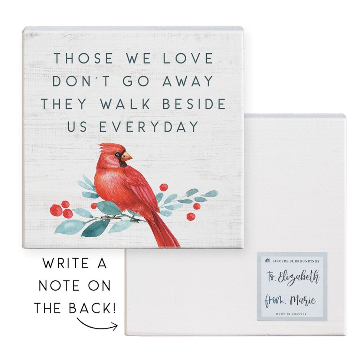 Decorative sign with a red cardinal bird and inspirational message  those we love don't go away they walk beside us every day.