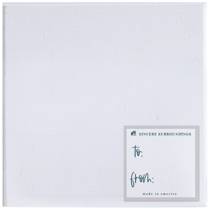 Decorative sign with to and from message on back